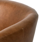 Close up of Four Hands Salena Swivel Chair in Sonoma Chestnut on a white background at Addison West