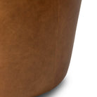 Close up of Four Hands Salena Swivel Chair in Sonoma Chestnut on a white background at Addison West