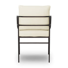 Back of Four Hands Segovia Outdoor Dining Chair in Vergo Cream on a white background at Addison West
