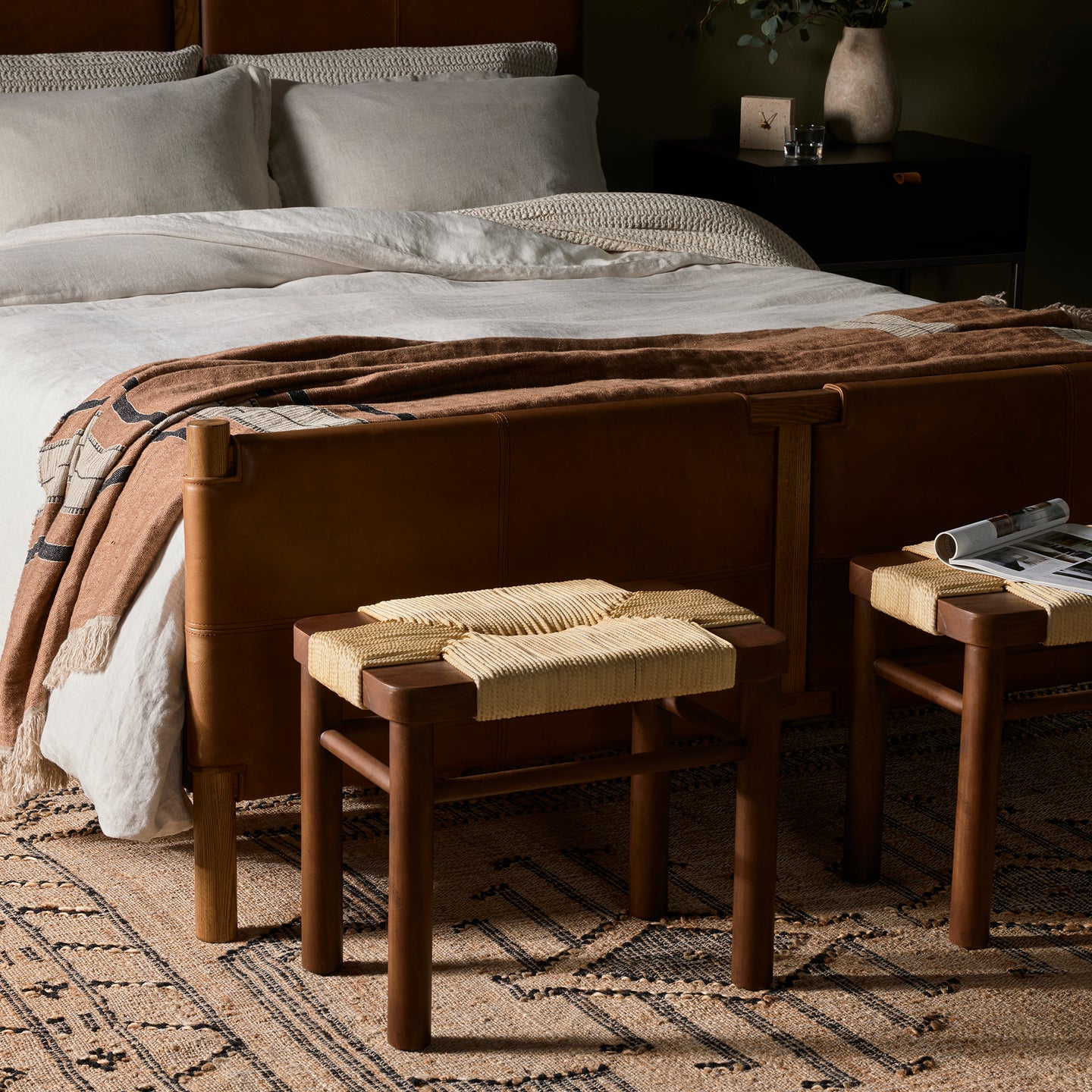 Four Hands Shona Stool in Vintage Cotton in a bedroom at the end of the bed