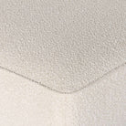 Corner of Four Hands Sinclair Cocktail Ottoman in Knoll Natural on a white background at Addison West