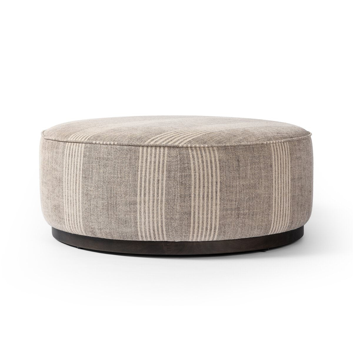 Four Hands Sinclair Large Round Ottoman in Manchester Flint on a white background at Addison West