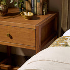 Four Hands Sullivan Small Nightstand in Saddle Tan Veneer in bedroom at Addison West.