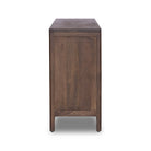 Side of Four Hands Sydney 9 Drawer Dresser in Brown Cane on a white background