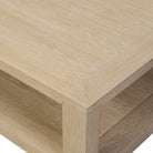 Close up of Four Hands Thomas Square Coffee Table in Bleached Oak Veneer on a white background at Addison West