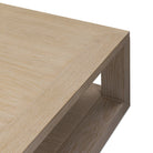 Close up of Four Hands Thomas Square Coffee Table in Bleached Oak Veneer on a white background at Addison West
