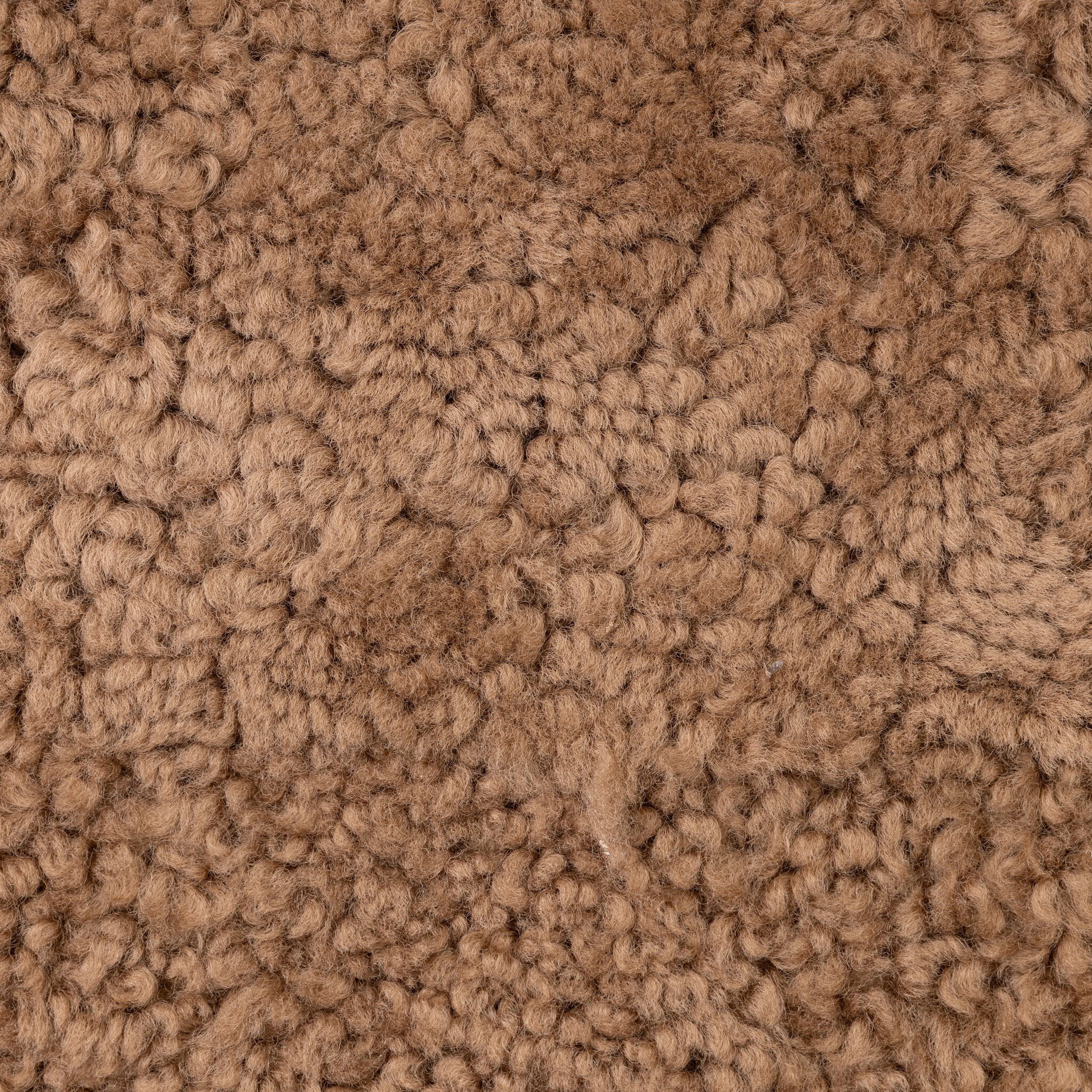 Close up of Four Hands Tobin Chair in Amber Sherling on white background at Addison West.