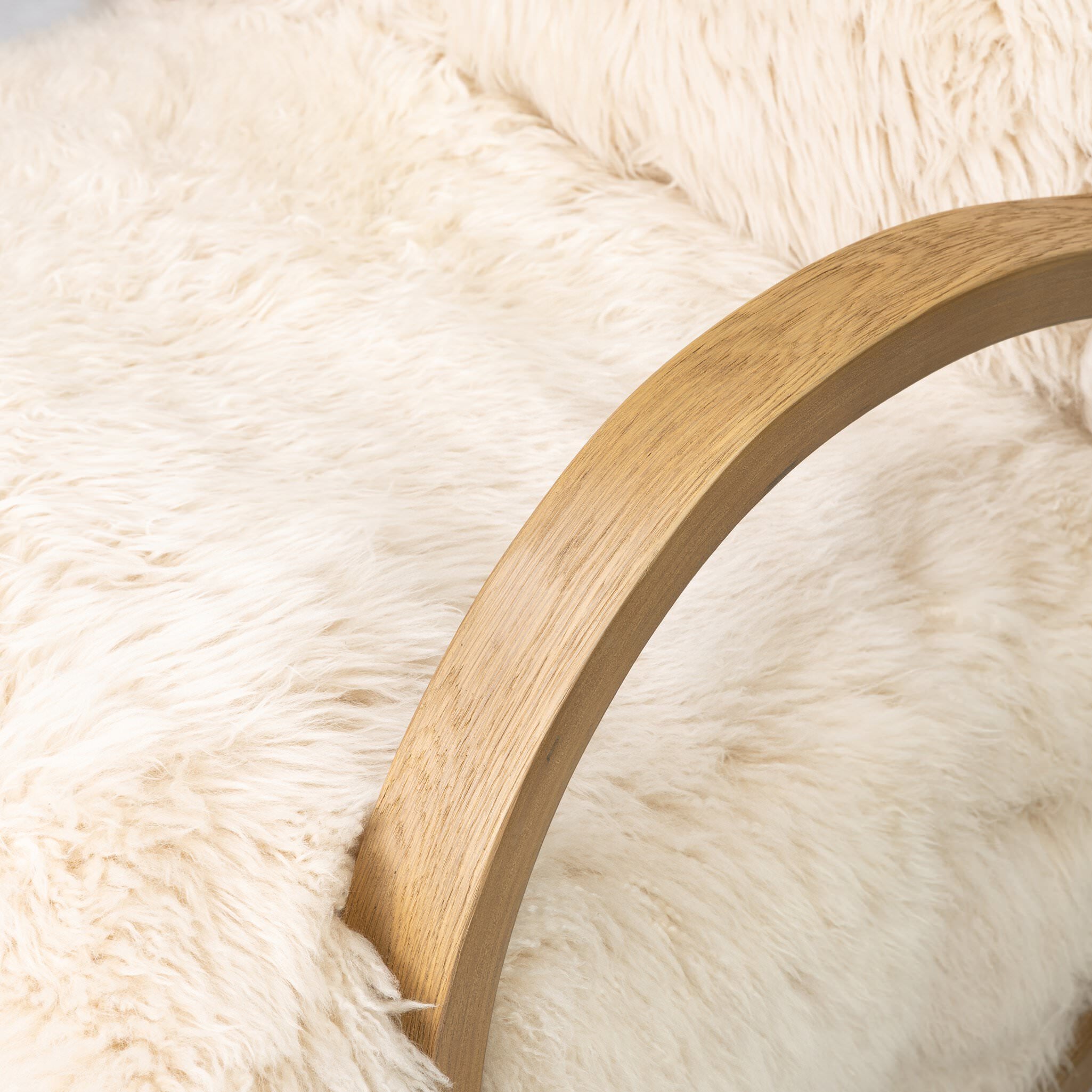 Close up of Four Hands Tobin Chair in Champagne Mongolian Fur on white background at Addison West.