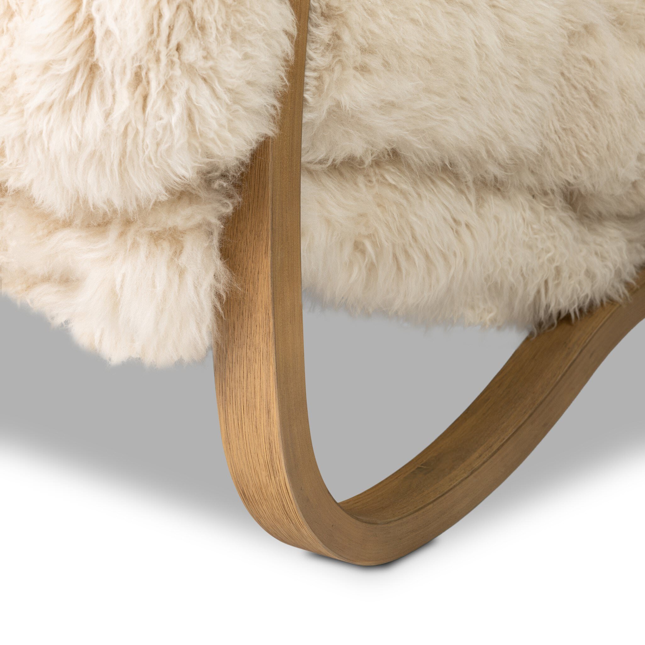 Close up of Four Hands Tobin Chair in Champagne Mongolian Fur on white background at Addison West.