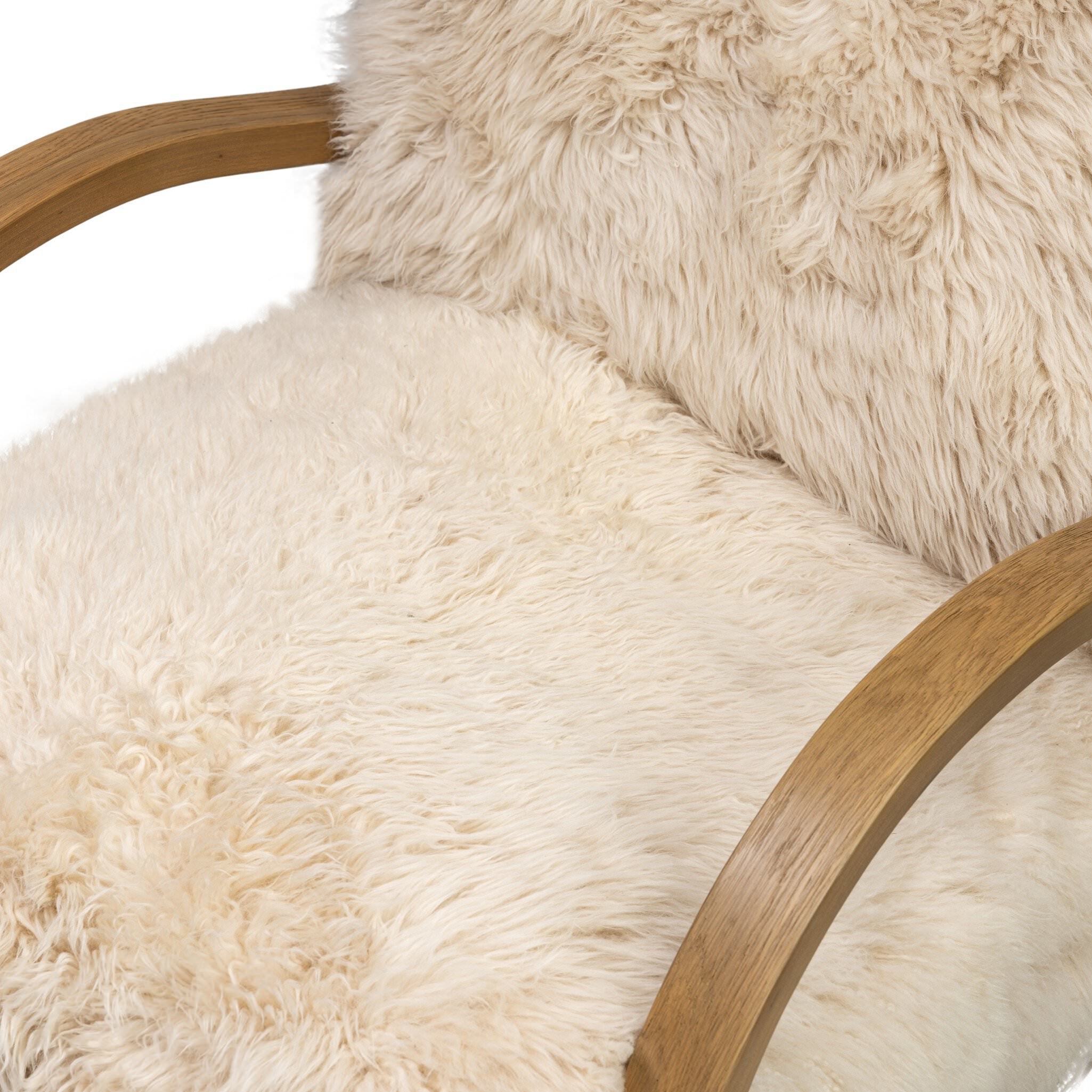 Close up of Four Hands Tobin Chair in Champagne Mongolian Fur on white background at Addison West.
