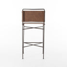 Back of Four Hands Wharton Bar Stool in Distressed Brown on a white background at Addison West