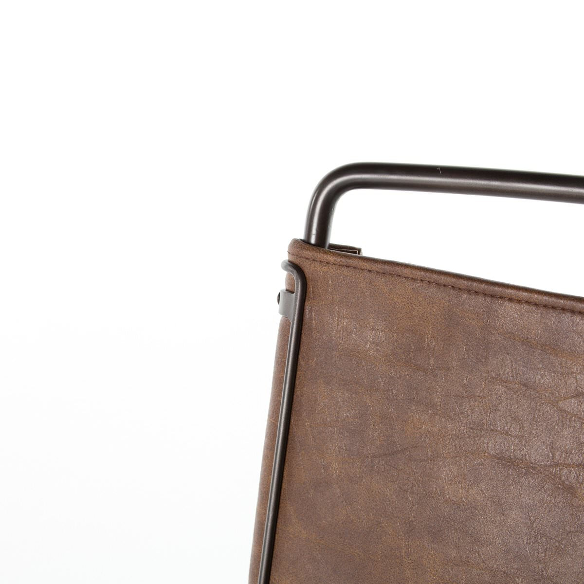 Close up of Four Hands Wharton Bar Stool in Distressed Brown on a white background at Addison West
