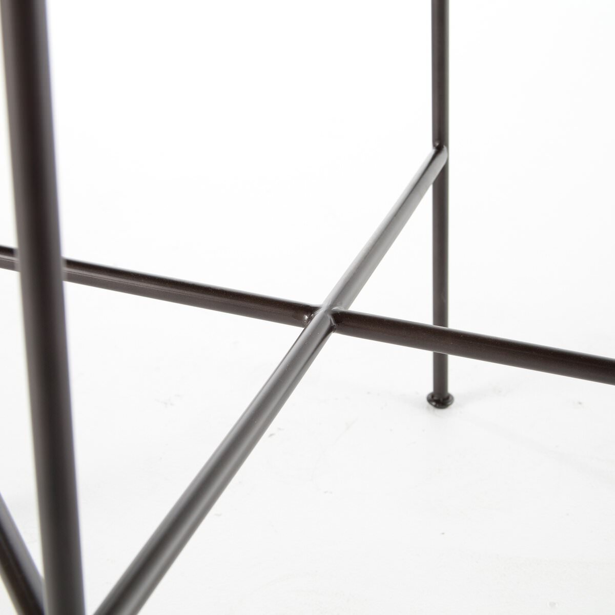 Close up of Four Hands Wharton Bar Stool in Distressed Brown on a white background at Addison West