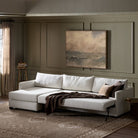 Four Hands Wickham 2-Piece Sleeper Sectional in Alameda Snow in a green living room at Addison West
