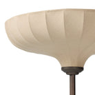 Close up of Four Hands Winslet Floor Lamp in Light Oil Rubbed Bronze on a white background at Addison West