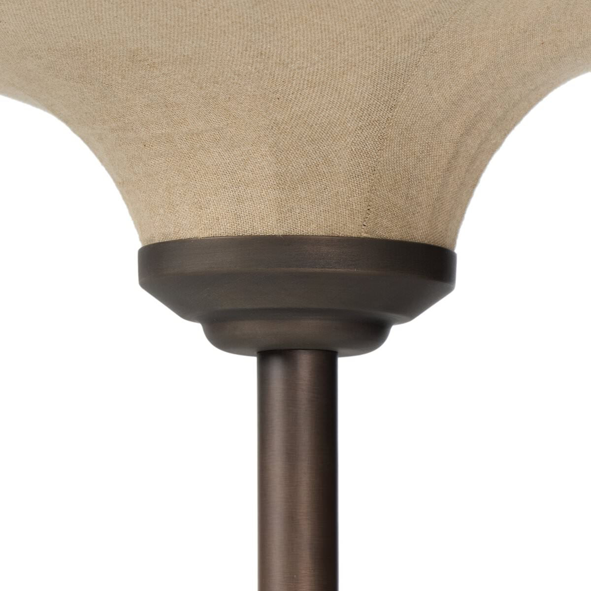 Close up of Four Hands Winslet Floor Lamp in Light Oil Rubbed Bronze on a white background at Addison West