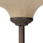 Close up of Four Hands Winslet Floor Lamp in Light Oil Rubbed Bronze on a white background at Addison West