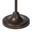 Close up of Four Hands Winslet Floor Lamp in Light Oil Rubbed Bronze on a white background at Addison West