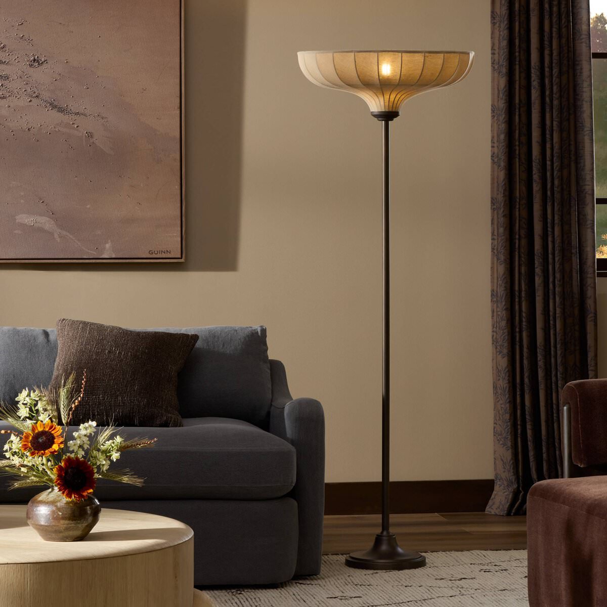 Four Hands Winslet Floor Lamp in Light Oil Rubbed Bronze in a living room at Addison West