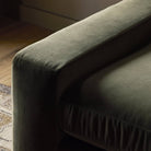 Close up of Four Hands Yelena Sofa in Surrey Olive in a living room at Addison West