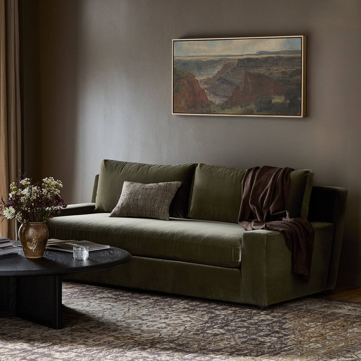 Four Hands Yelena Sofa in Surrey Olive in a living room at Addison West