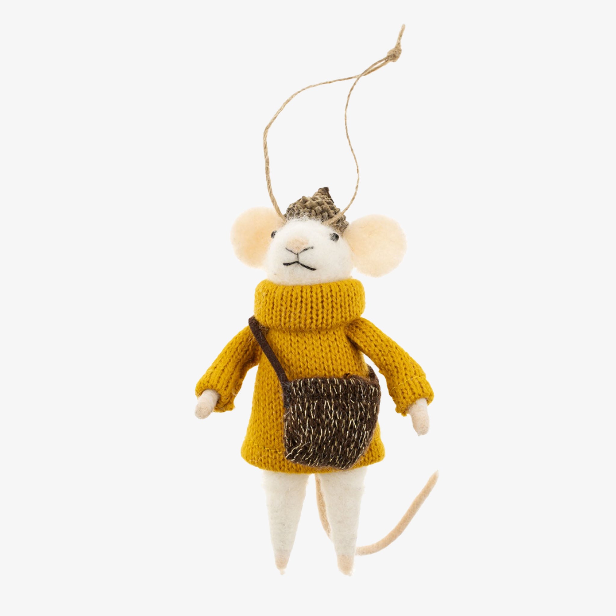 Decorative mouse ornament wearing a yellow sweater and carrying a bag on a white background