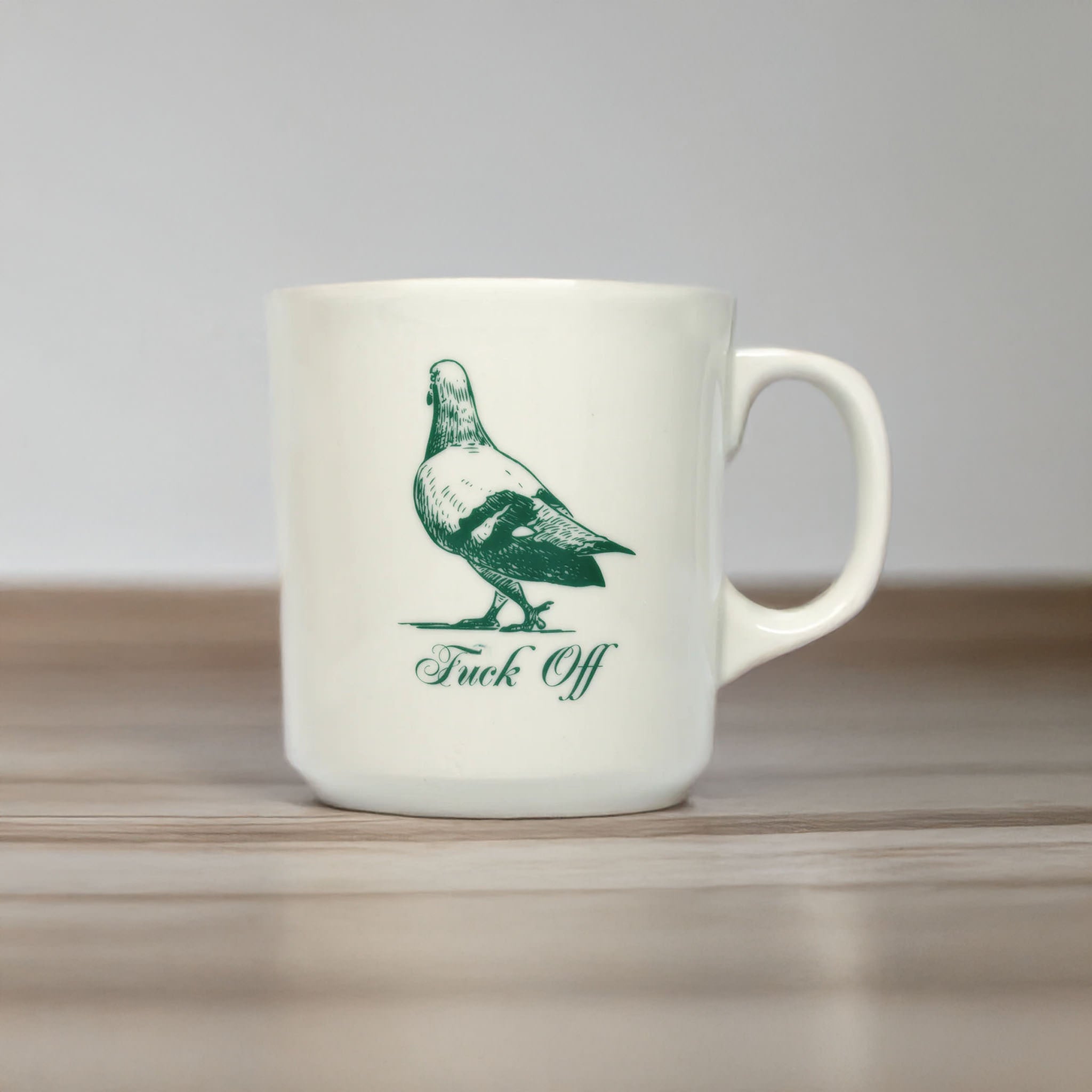 Fuck Off Mug on a desk at Addison West