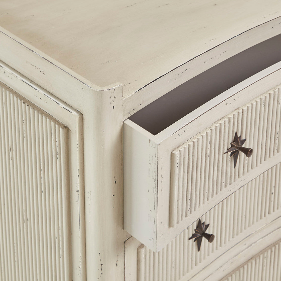 Close up of Furniture Classics Reeded Chest of Drawers on a white background at Addison West