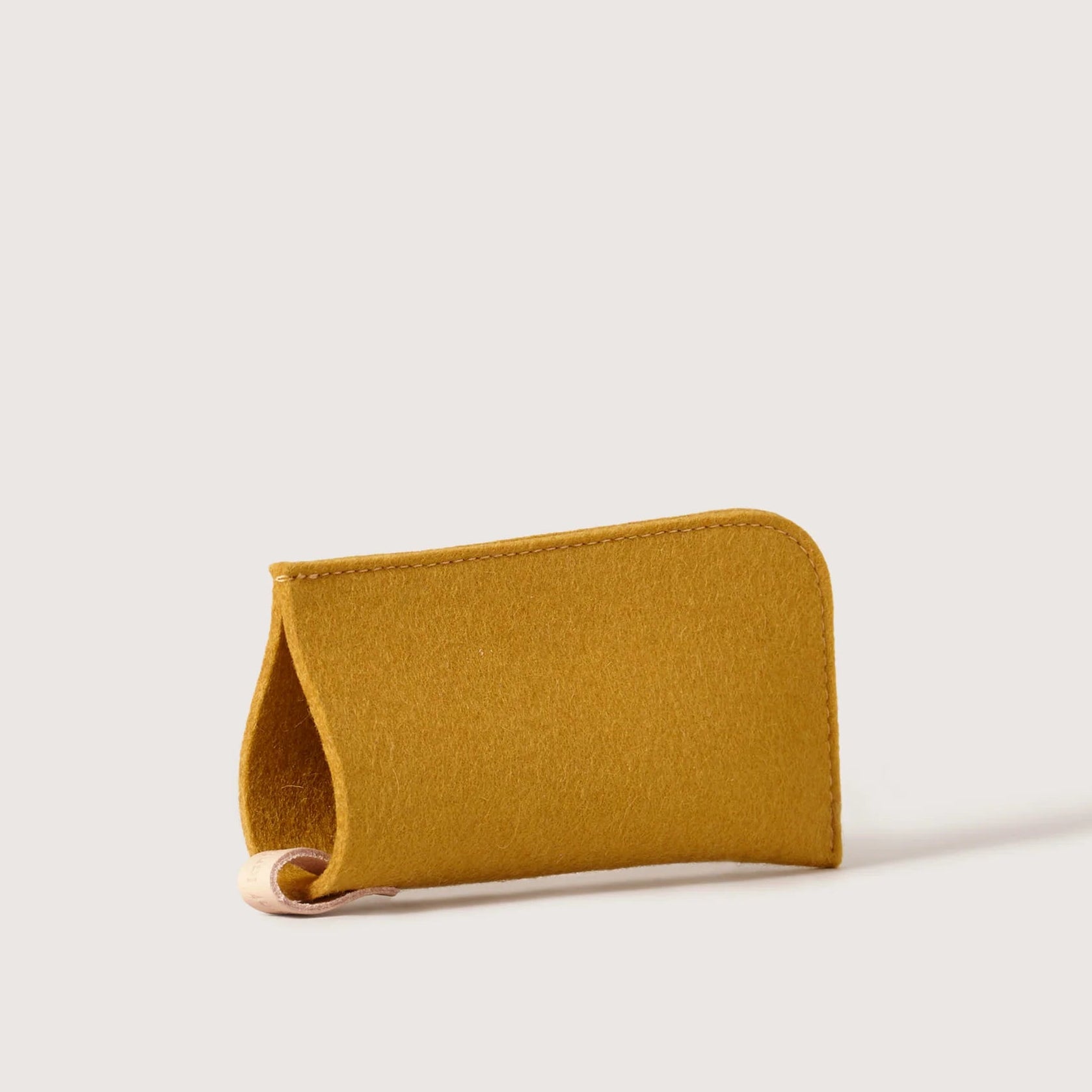 Graf Lantz Felt Glasses Sleeve in Dijon on a white background at Addison West