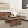 Grier 42" Square Medium Brown Solid Wood with Cane Coffee Table in a light and airy living room