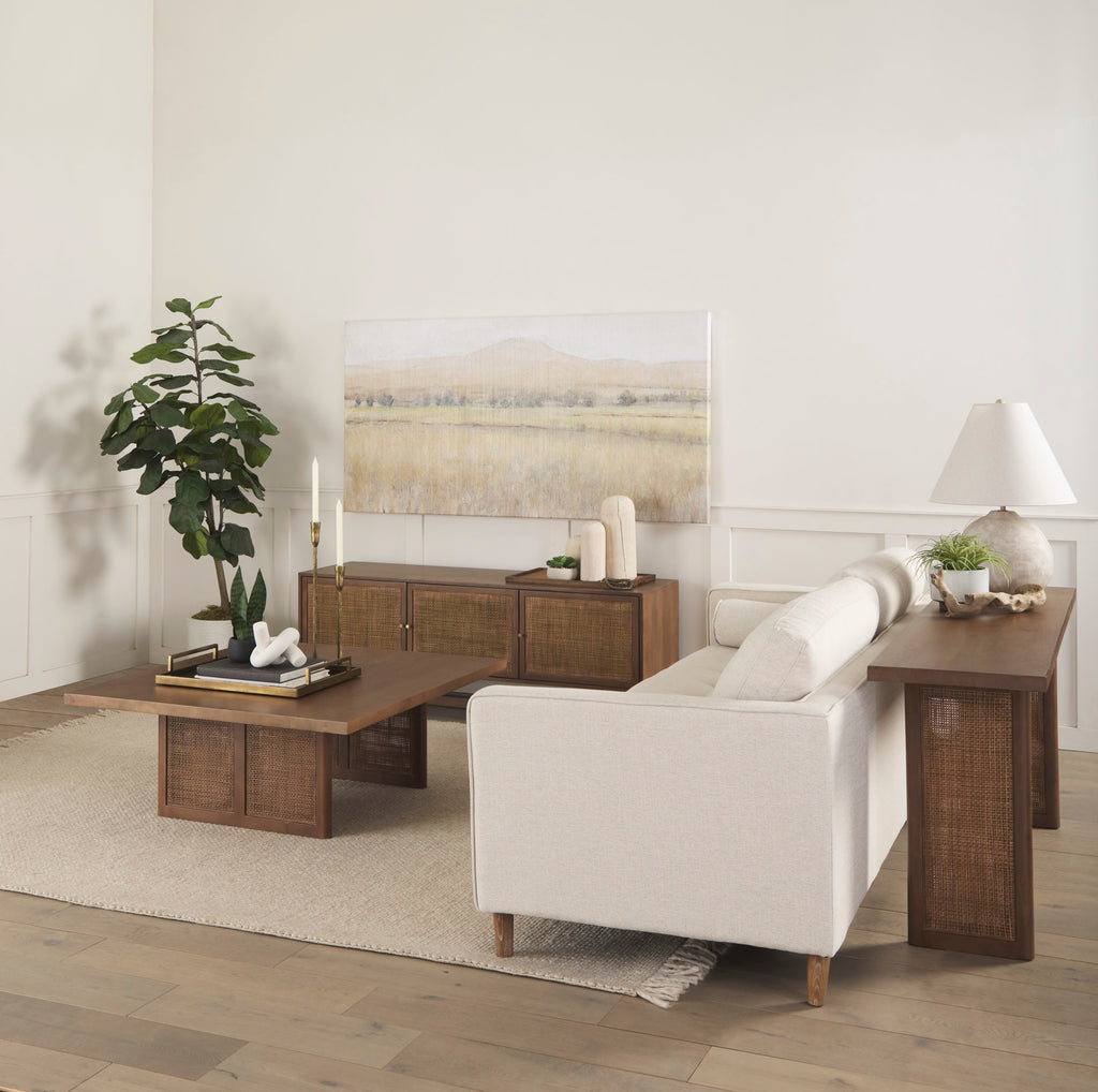 Grier 42" Square Medium Brown Solid Wood with Cane Coffee Table in a light and airy living room