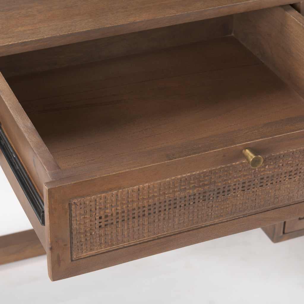 Close up of open drawer of Grier Medium Brown Solid Wood with Cane Office Desk on a white background