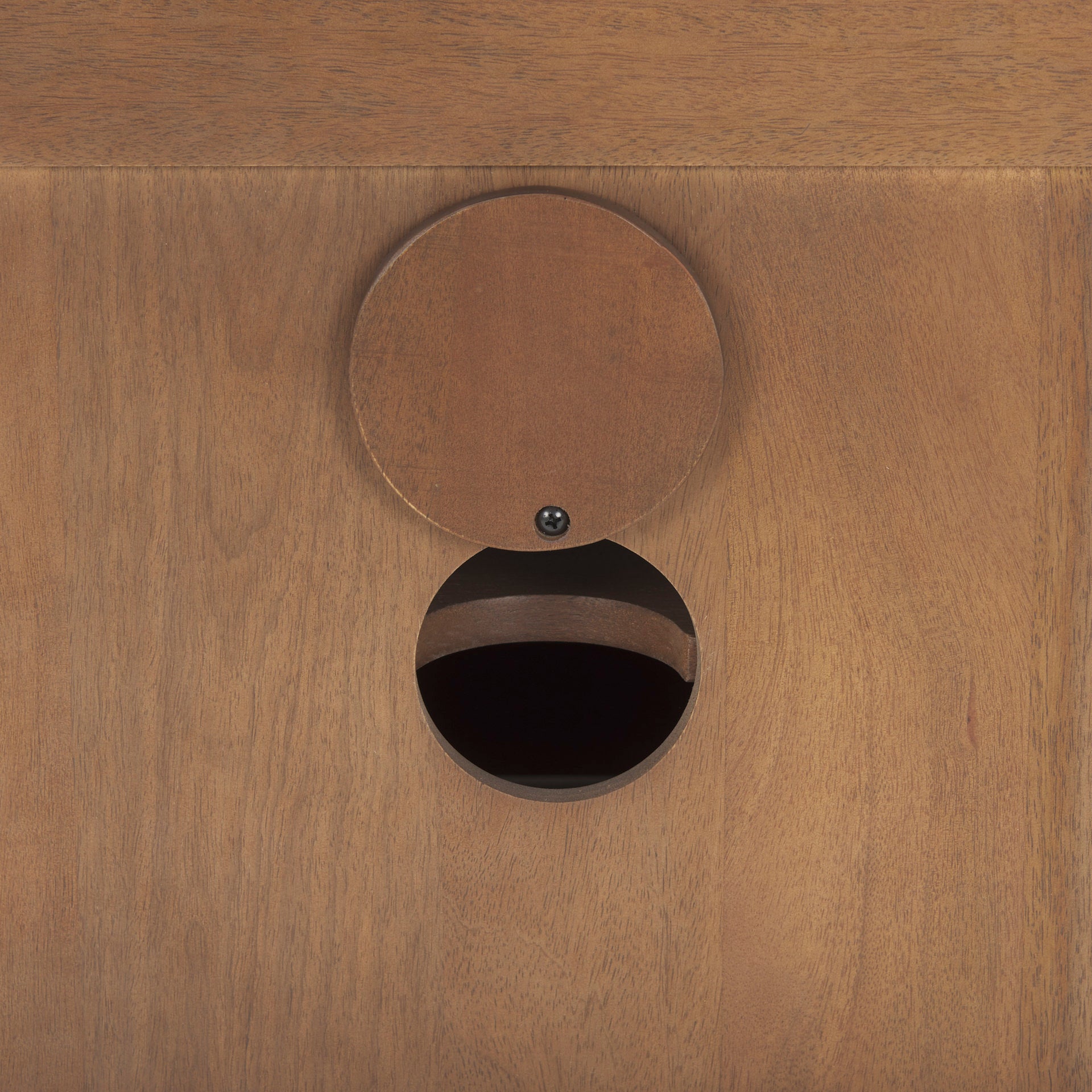 Close up of back of Grier Medium Brown Solid Wood with Cane Media Console on a white background
