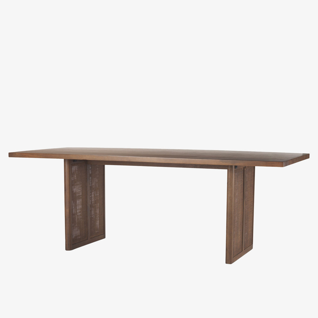 Mango wood Dining Table with two support legs in Dark Wash with Cane insets on base on a white background