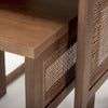 Close up of Grier Set of 2 Medium Brown Solid Wood with Cane Nesting Accent Tables on a white background