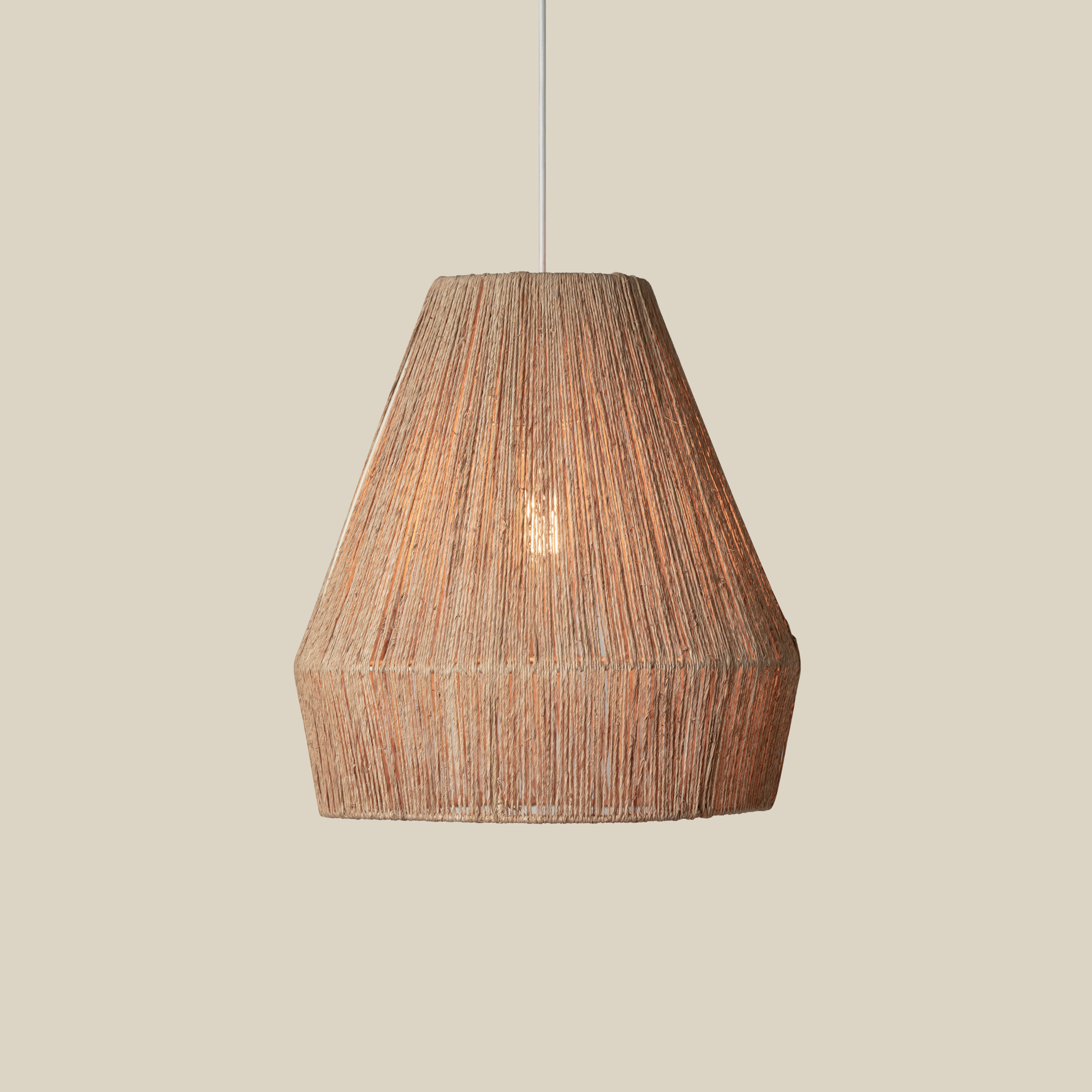Collins Jute Pendant on a beige background at Addison West