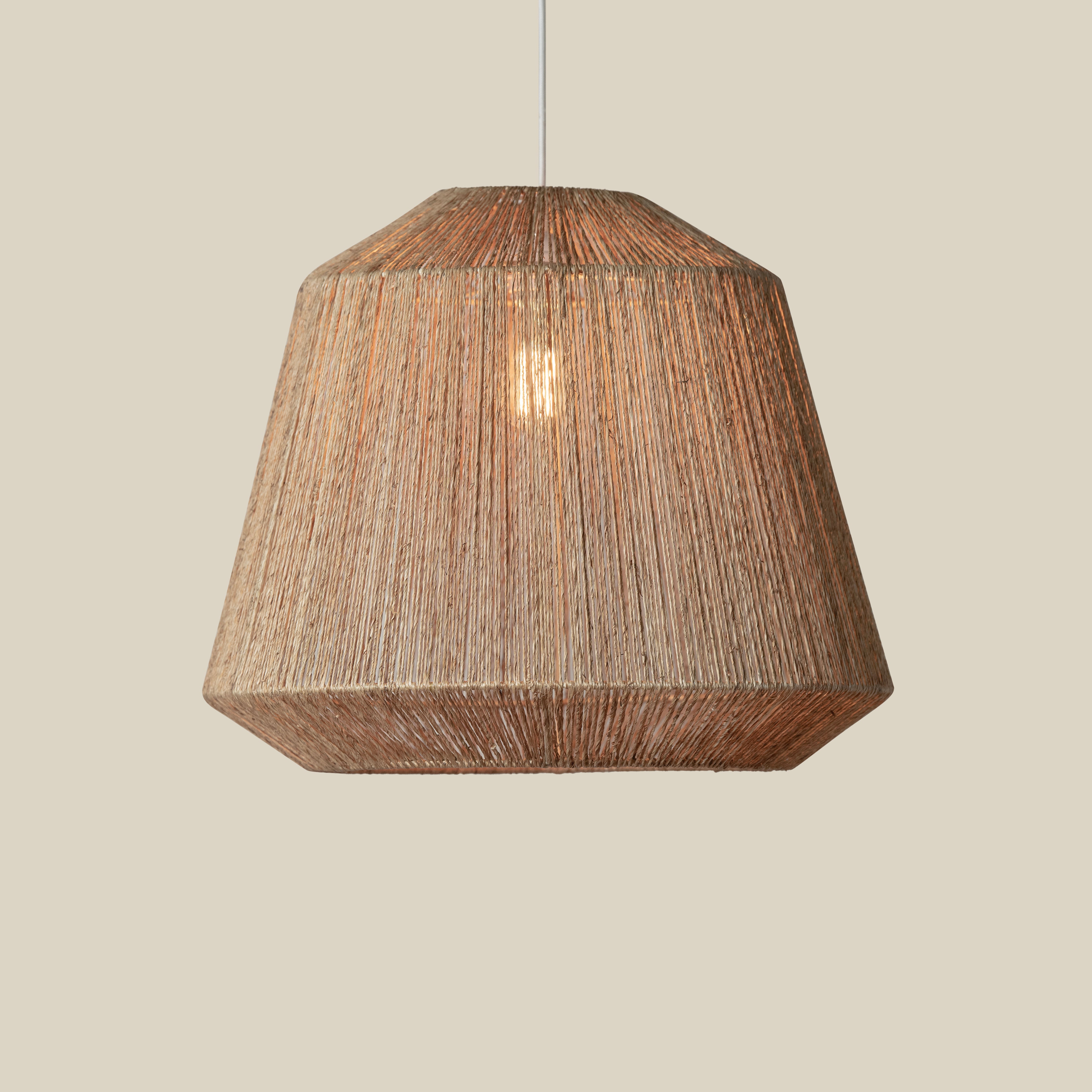 Manhattan Jute Pendant in Natural on a beige background at Addison West