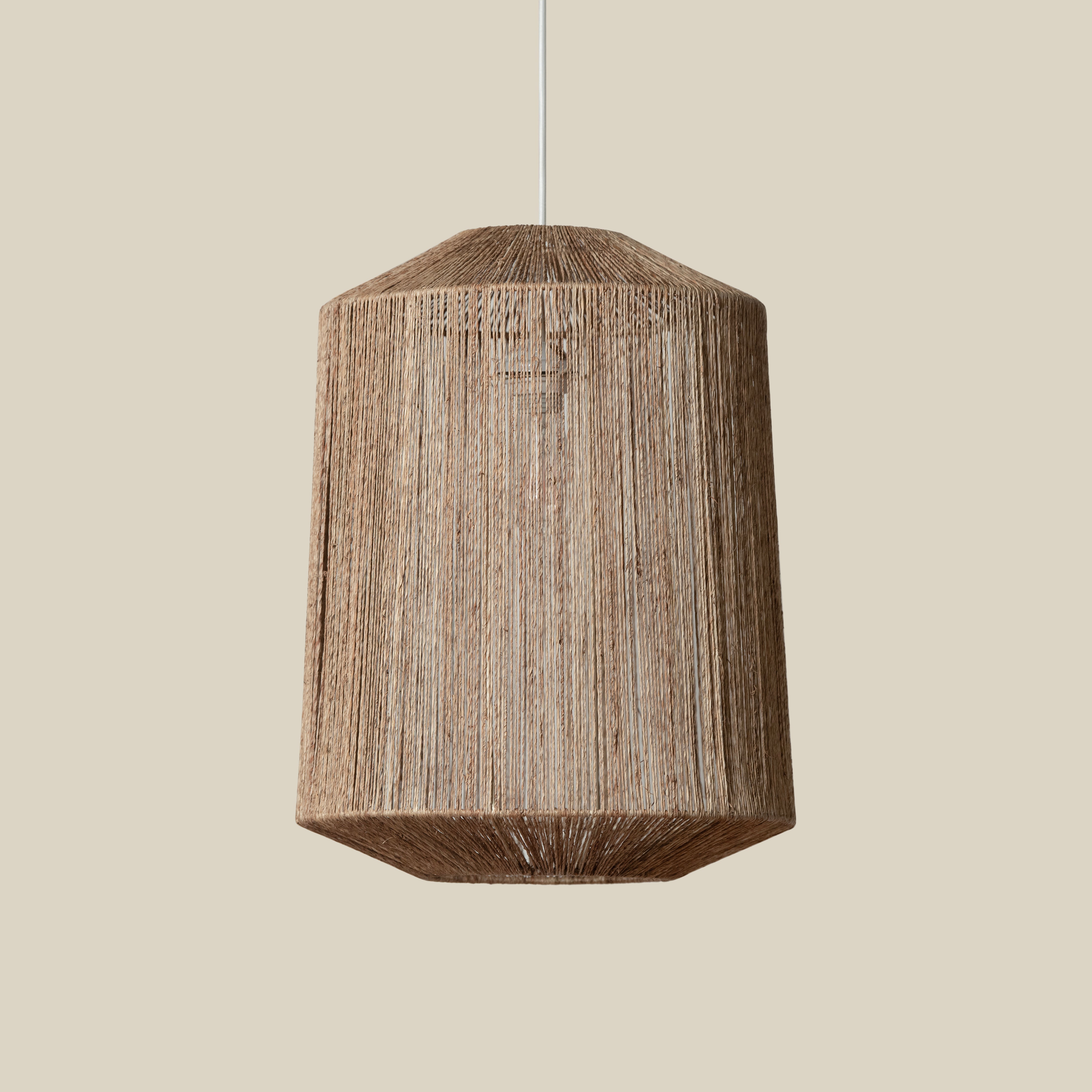 Walker Pendant on a beige background at Addison West