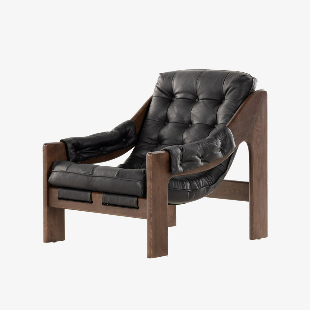 Four Hands Furniture leather sling Halston Chair in Heirloom Black on a white background