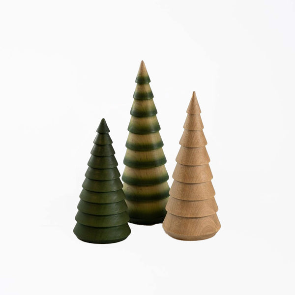 Hauskaa brand carved wood decorative trees in green and natural on a white background