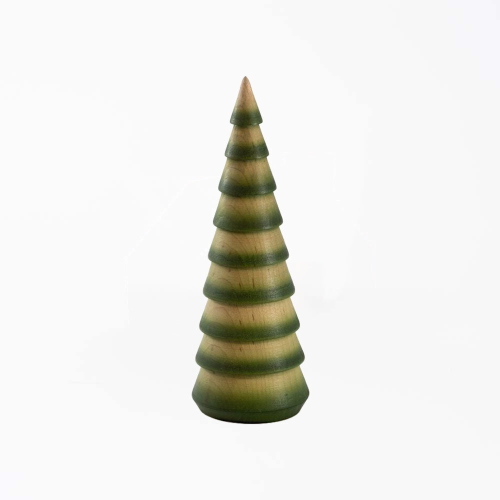 Hauskaa brand carved wood decorative tree in natural and green on a white background