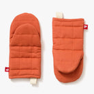Hedley & Bennett Paprika Oven Mitts on plain background at Addison West.
