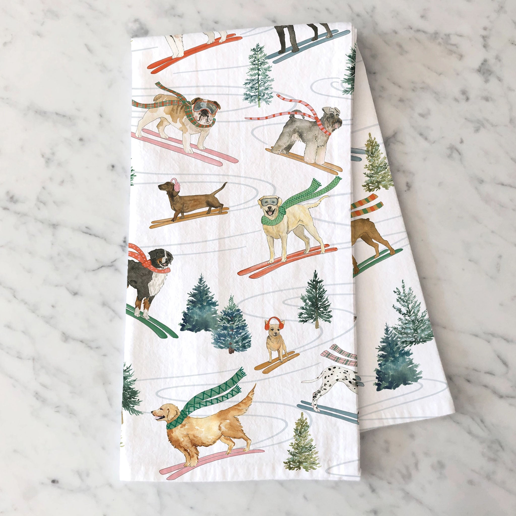 Holiday Ski Dogs Tea Towel on a marble kitchen counter at Addison West