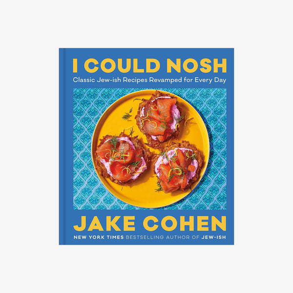 Blue front cover of cookbook titled I Could Nosh by Jake Cohen on a white background