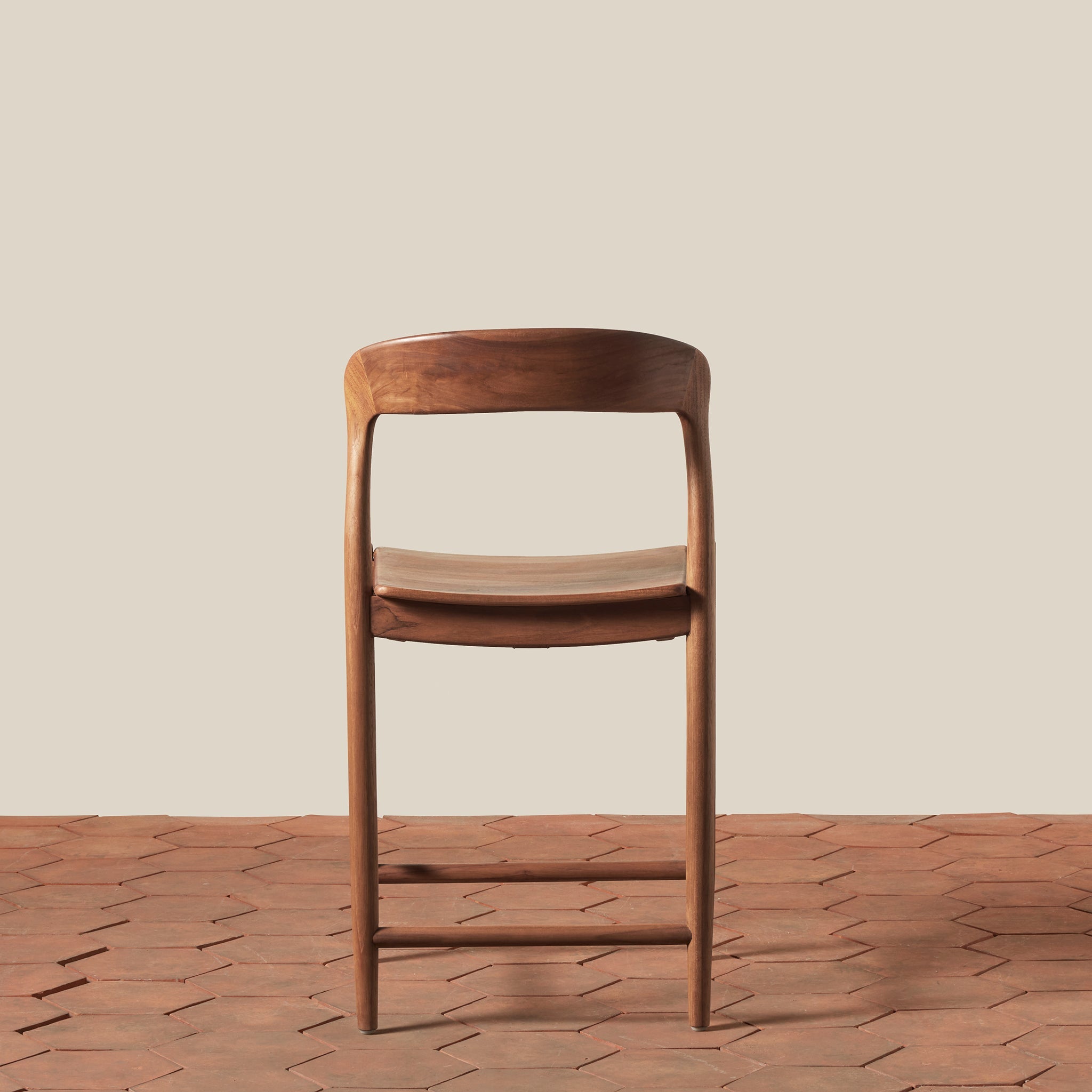 Ingrid Counter Stool on a beige background at Addison West