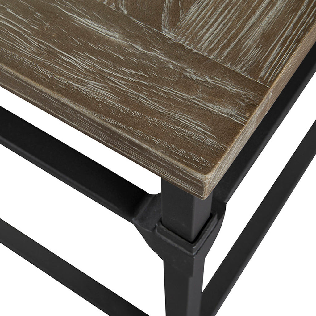 Square end table with black iron legs and wood inlay top on a white background