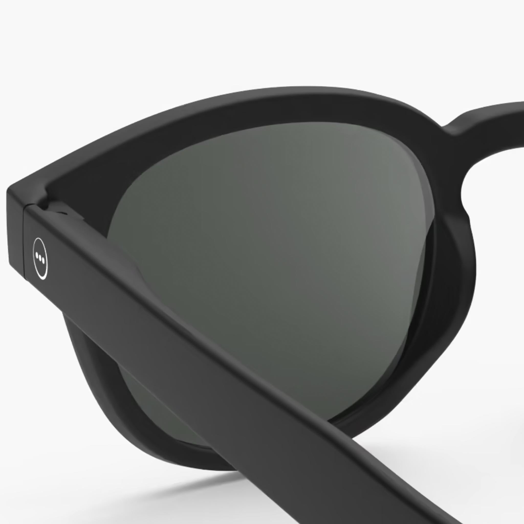 Izipizi #C Black Sunglasses on a white background at Addison West