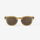 Izipizi #C Golden Green Sunglasses on a white background at Addison West
