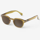 Izipizi #C Golden Green Sunglasses on a white background at Addison West
