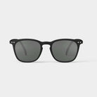 Izipizi #E Black Sunglasses on a white background at Addison West